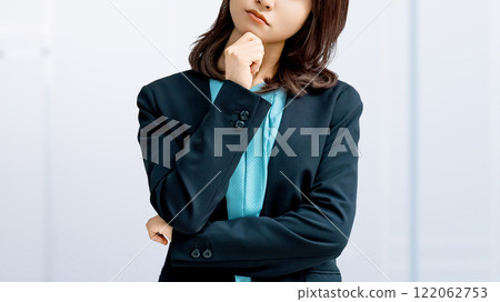 A woman thinking/businesswoman A woman thinking/businesswoman 122062753