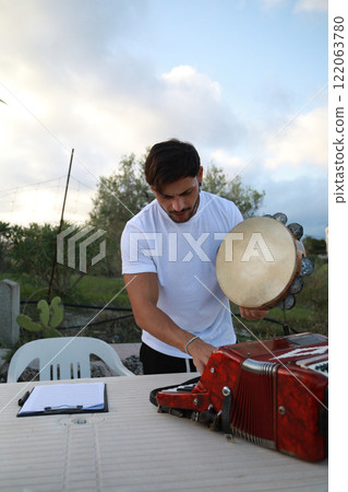 Traditional Accordion Playing Close Up Traditional Accordion Playing Close Up 122063780