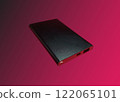 Slim Black and white power bank isolated on Dark-Red background. Power bank for charging mobile devices 122065101