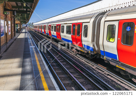 London Underground Train Arriving at Station 122065171