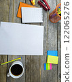 Office desk with various office supplies 122065276
