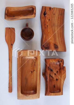 Wooden kitchen utensils stacked view close up isolated Wooden kitchen utensils stacked view close up isolated 122065285
