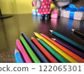 Colored pencils are on the office table 122065301