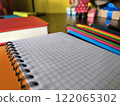 office supplies on a wooden work table. 122065302