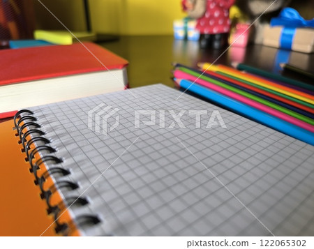 office supplies on a wooden work table. 122065302