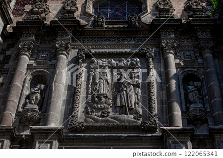 Detail of the facade of the old Basilica of Guadalupe known as Expiatory Temple of Christ the King built in 1709 in Mexico City. Detail of the facade of the old Basilica of Guadalupe known as Expiatory Temple of Christ the King built in 1709 in Mexico City. 122065341