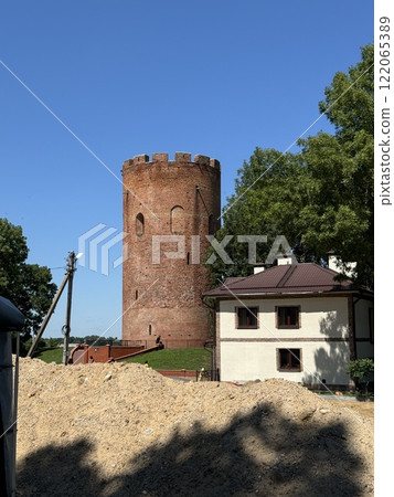 Historic Brick Tower with Surrounding Structures Historic Brick Tower with Surrounding Structures 122065389
