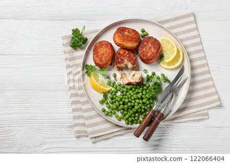 Danish atlantic cod fish cakes with green peas Danish atlantic cod fish cakes with green peas 122066404