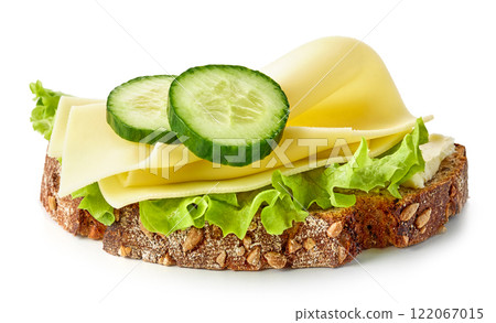 bread slice with fresh cheese and cucumber 122067015