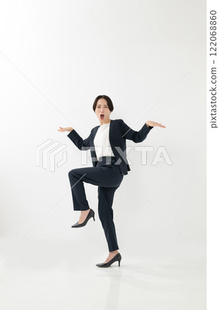 A woman in a strange pose, suit, career woman 122068860