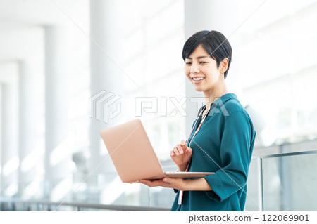 Business woman working in the office Business woman working in the office 122069901