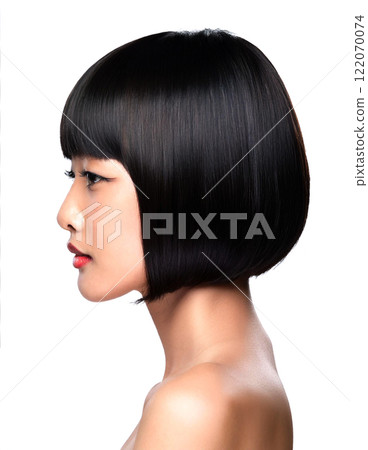 A woman's beautiful profile and black bob hair. A woman's beautiful profile and black bob hair. 122070074