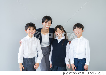 Classmates and teacher in the classroom 122072218