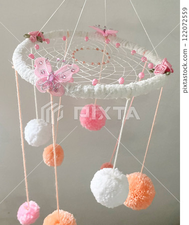 I made a dream catcher mobile for a baby shower. I made a dream catcher mobile for a baby shower. 122072559