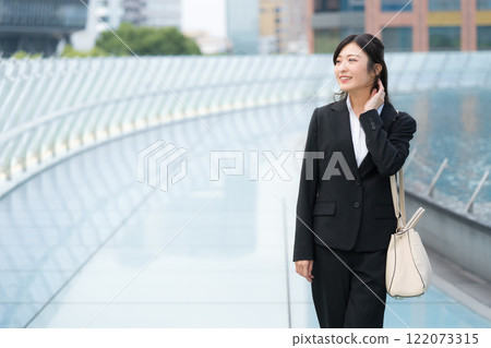 A businesswoman walking in a suit Newcomer Nagoya Sakae OASIS21 Water Spaceship 122073315