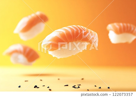 Fresh salmon nigiri sushi floating on vibrant orange background 122073357
