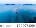Tourists crossing Jindo-gun's miracle Sea Road revealed by low tide 122073660