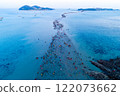 Tourists crossing Jindo-gun's miracle Sea Road revealed by low tide 122073662