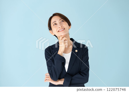 Female lawyer worried smile Female lawyer worried smile 122075746