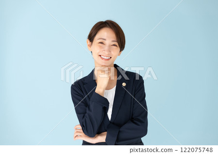 Female lawyer worried smile Female lawyer worried smile 122075748