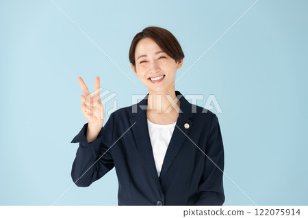 Female lawyer peace sign 122075914