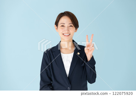 Female lawyer peace sign Female lawyer peace sign 122075920