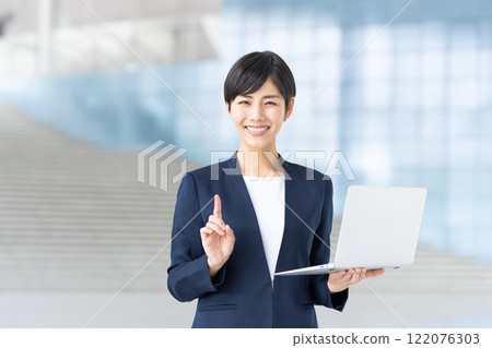 Business woman working in the office 122076303