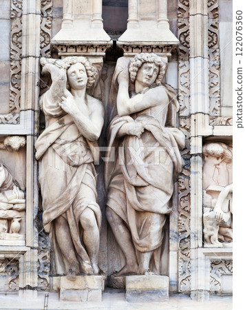 Statue on the wall of Milan cathedral Statue on the wall of Milan cathedral 122076360