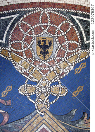 ITALY, MILAN - SEPTEMBER 27, 2014 - Floor mosaic in galleria Vittorio Emanuele II 122076367