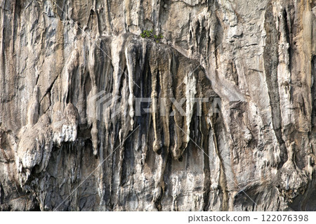 Vertical cliff wall 122076398