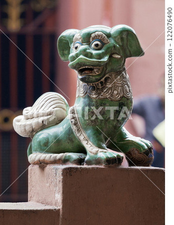 Chinese lion at the entrance of a temple Chinese lion at the entrance of a temple 122076490