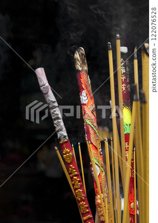 Incence sticks in a Buddhist temple 122076528