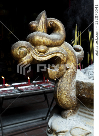 Decorative incence burner in a Vietnamese temple Decorative incence burner in a Vietnamese temple 122076541