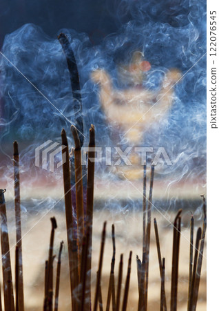 Incence sticks in a Buddhist temple 122076545