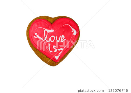 Heart shaped gingerbread cookie isolated on white background Heart shaped gingerbread cookie isolated on white background 122076746