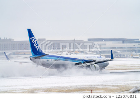 New Chitose Airport in winter: Snow plumes and landing planes, Chitose, Hokkaido 122076831