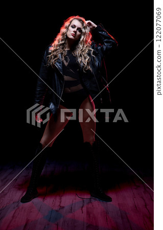 A Bold Portrait of a Confident Woman in a Chic Leather Jacket with Attitude and Grace A Bold Portrait of a Confident Woman in a Chic Leather Jacket with Attitude and Grace 122077069