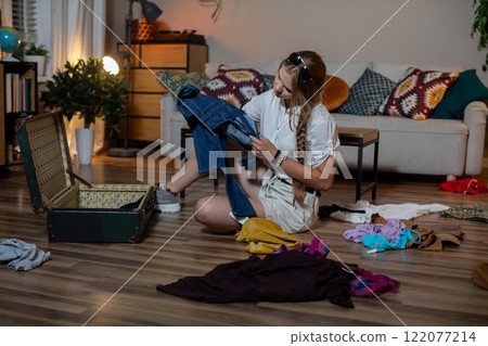 Pack efficiently for your next trip by organizing clothes and accessories to minimize stress Pack efficiently for your next trip by organizing clothes and accessories to minimize stress 122077214
