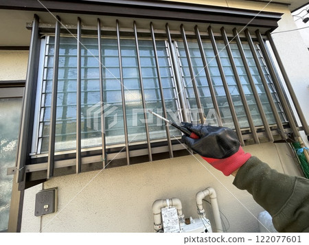 Man trying to break through the bars Man trying to break through the bars 122077601
