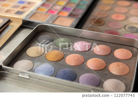 A vibrant and colorful makeup palette featuring eyeshadow and blush for artistic expression 122077743