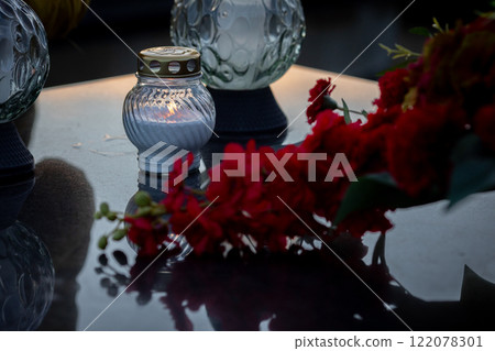 Stunning and Elegant Evening Decor featuring a Beautiful Candle and Bougainvillea Flowers Stunning and Elegant Evening Decor featuring a Beautiful Candle and Bougainvillea Flowers 122078301