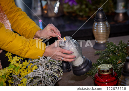 Lighting a Memorial Candle in Remembrance of Loved Ones Who Have Passed Away, Honor Their Legacy Lighting a Memorial Candle in Remembrance of Loved Ones Who Have Passed Away, Honor Their Legacy 122078316