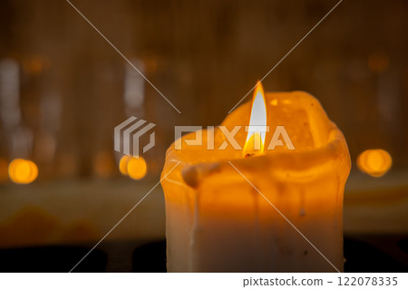 The Serene Candle Flame Creates a Beautiful and Inviting Atmosphere of Tranquility 122078335