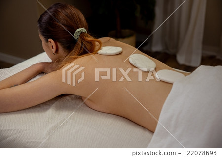 Experience the soothing benefits of a relaxing Hot Stone Massage Therapy Session today Experience the soothing benefits of a relaxing Hot Stone Massage Therapy Session today 122078693