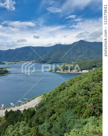 Beautiful lake and lush mountain scenery Beautiful lake and lush mountain scenery 122079681