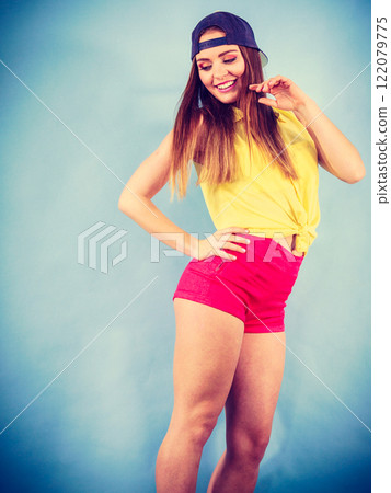Young trendy smiling female dancer. Young trendy smiling female dancer. 122079775