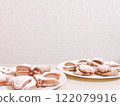 Next to the trendy ribbon buns 122079916