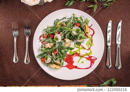 Portion of gourmet fresh salad with artichokes 122080216