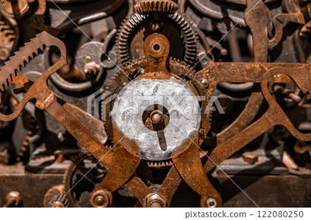 Rusty old vintage clockwork closeup photo 122080250