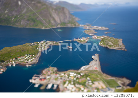 Amazing landscape of the Lofoten Islands from the top of Reinebringen Mountain with blue sky , county of Nordland, Norway. Amazing landscape of the Lofoten Islands from the top of Reinebringen Mountain with blue sky , county of Nordland, Norway. 122080713